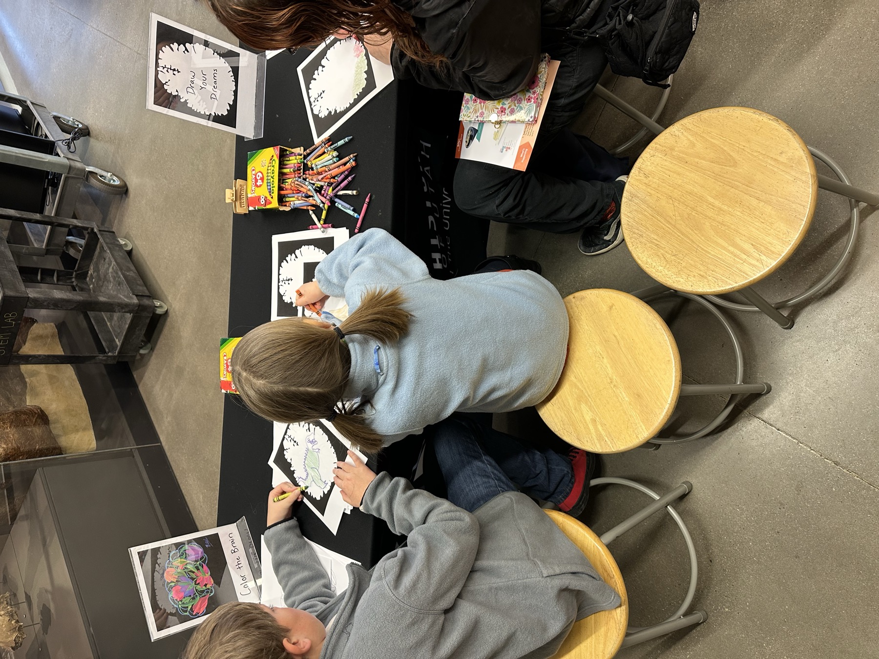 Kids drawing at Natural History Museum of Utah event